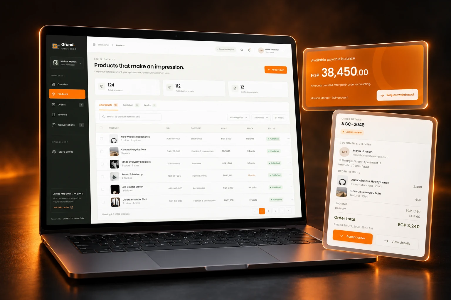 Grand Commerce seller portal shown on a graphite laptop with product and order panels